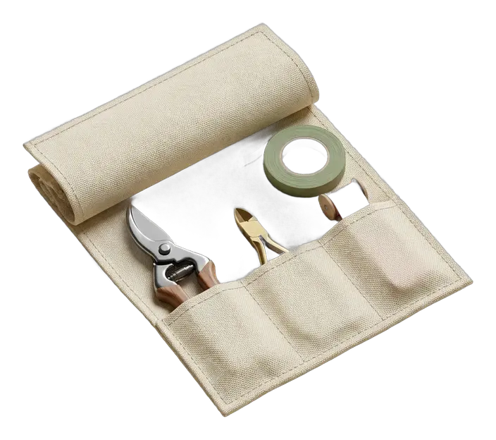 Open florist tool roll with secateurs, wire cutters, ribbon and floral tape